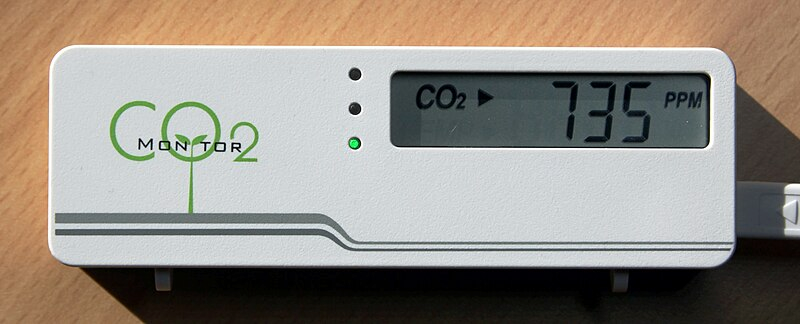 Shown is a colour photograph of a carbon dioxide sensor showing carbon dioxide reading of 735 PPM.