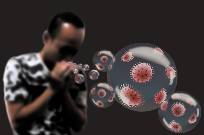 Shown is an illustration of a person coughing into their hands and droplets floating of water containing viruses floating in the air.